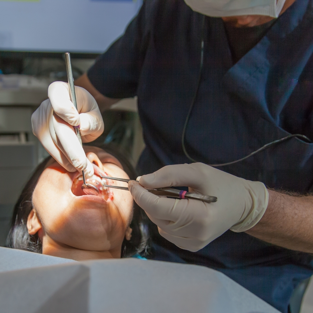 Patient receiving urgent dental care during a dental emergency at Dental Art Clinic in Cambridge.