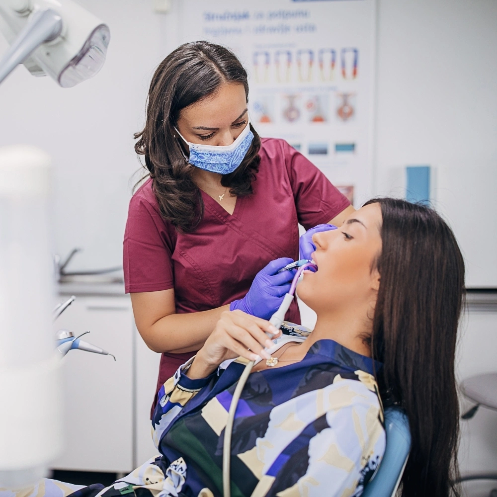 Patient receiving urgent dental treatment for a dental emergency at Dental Art Clinic in Cambridge