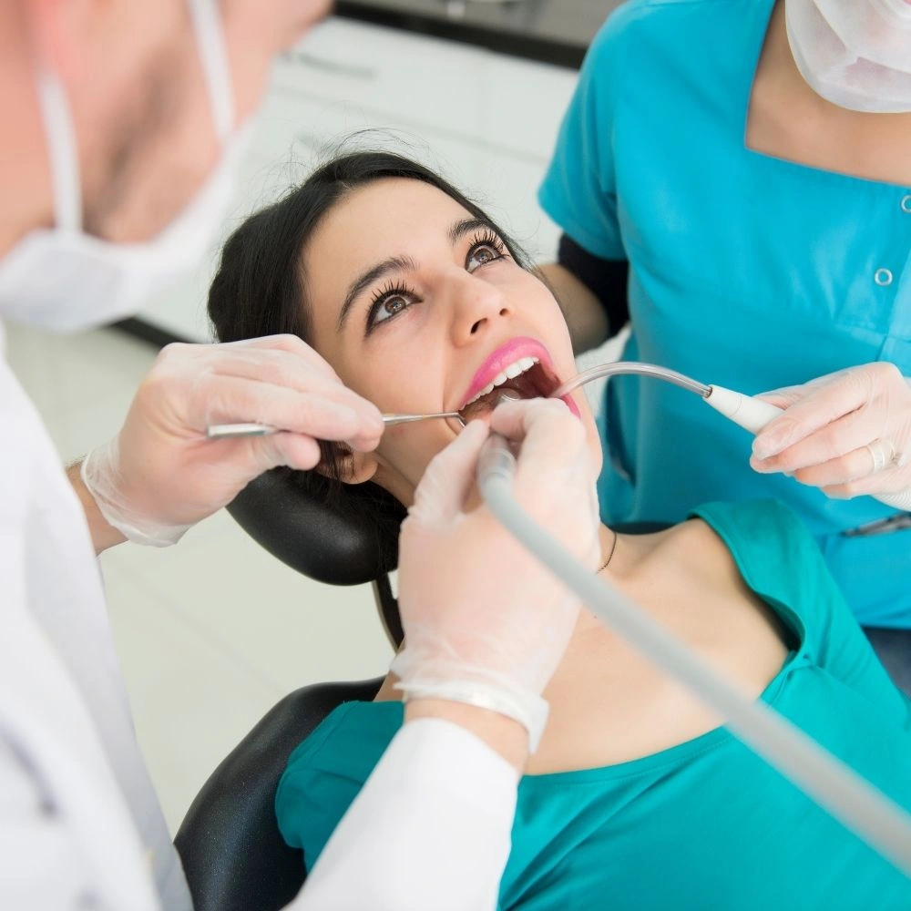 Patient receiving urgent dental care during a dental emergency at Dental Art Clinic in Cambridge
